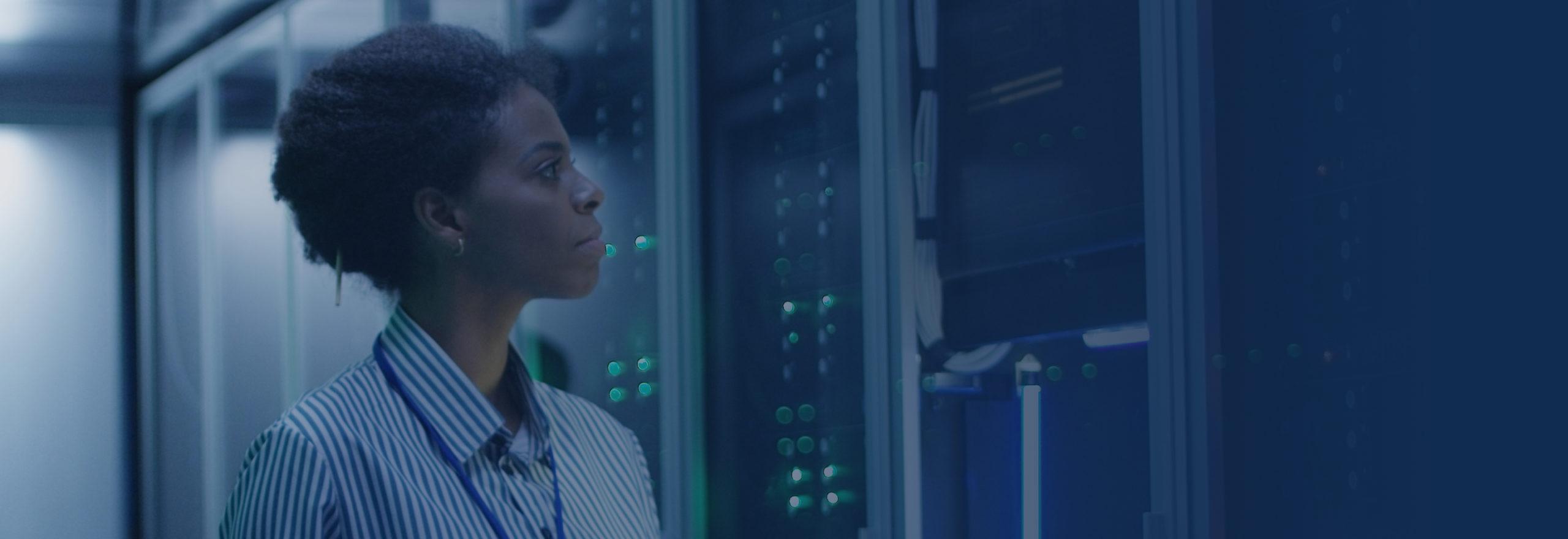 picture of woman providing network support and maintenance in data center